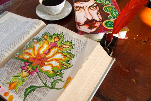 The pages of a discarded Italian dictionary sprout oversized, exotically colored flowers and vines